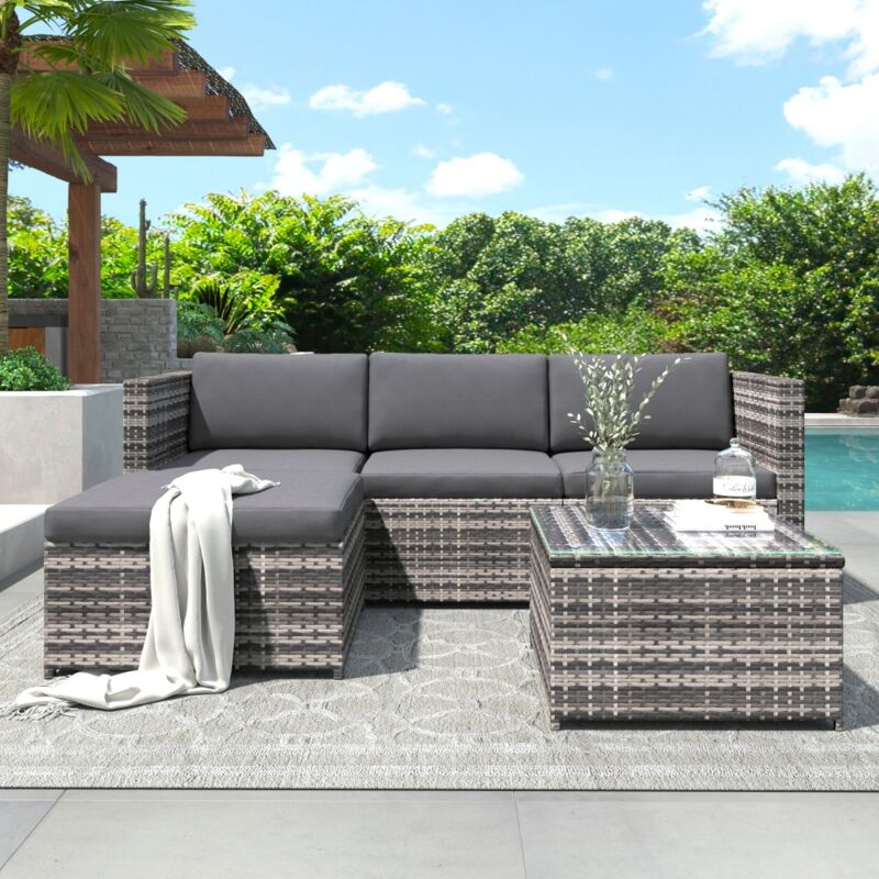 Ensemble canapé en poly rotin avec coussins d'assise et de dossier, table lounge avec plateau en verre, gris