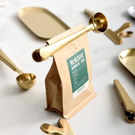 Ensemble cuillère à café dorée et support