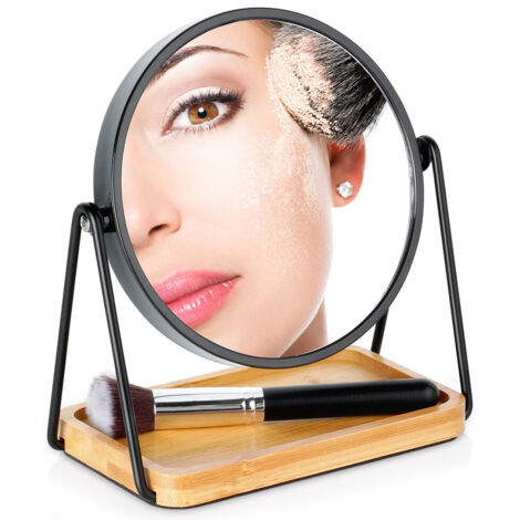 Espejo cosmético de bambú con aumento de doble cara sobre soporte