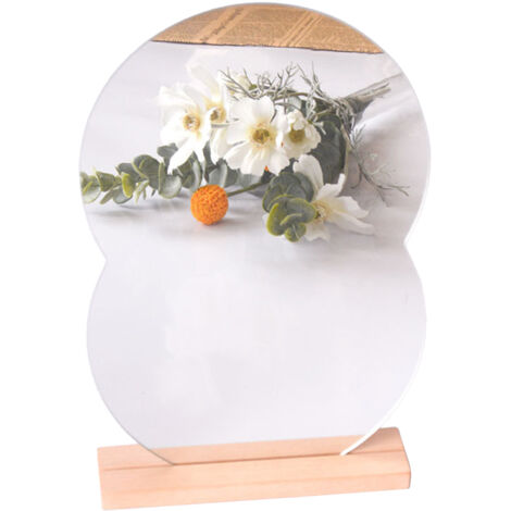 Espejo decorativo acrílico con forma de nube para el dormitorio con base de madera blanca.