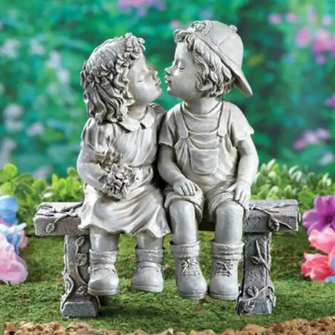 Estatua de jardín de besos