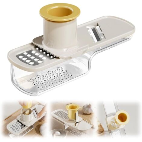 Este molinillo de jengibre y ajo 3 en 1 para la cocina incluye un rallador compacto con protector de manos y cuchillas de acero inoxidable.