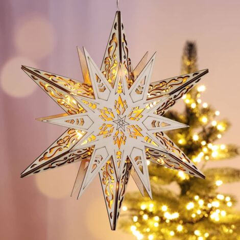 Estrella de madera tallada iluminada