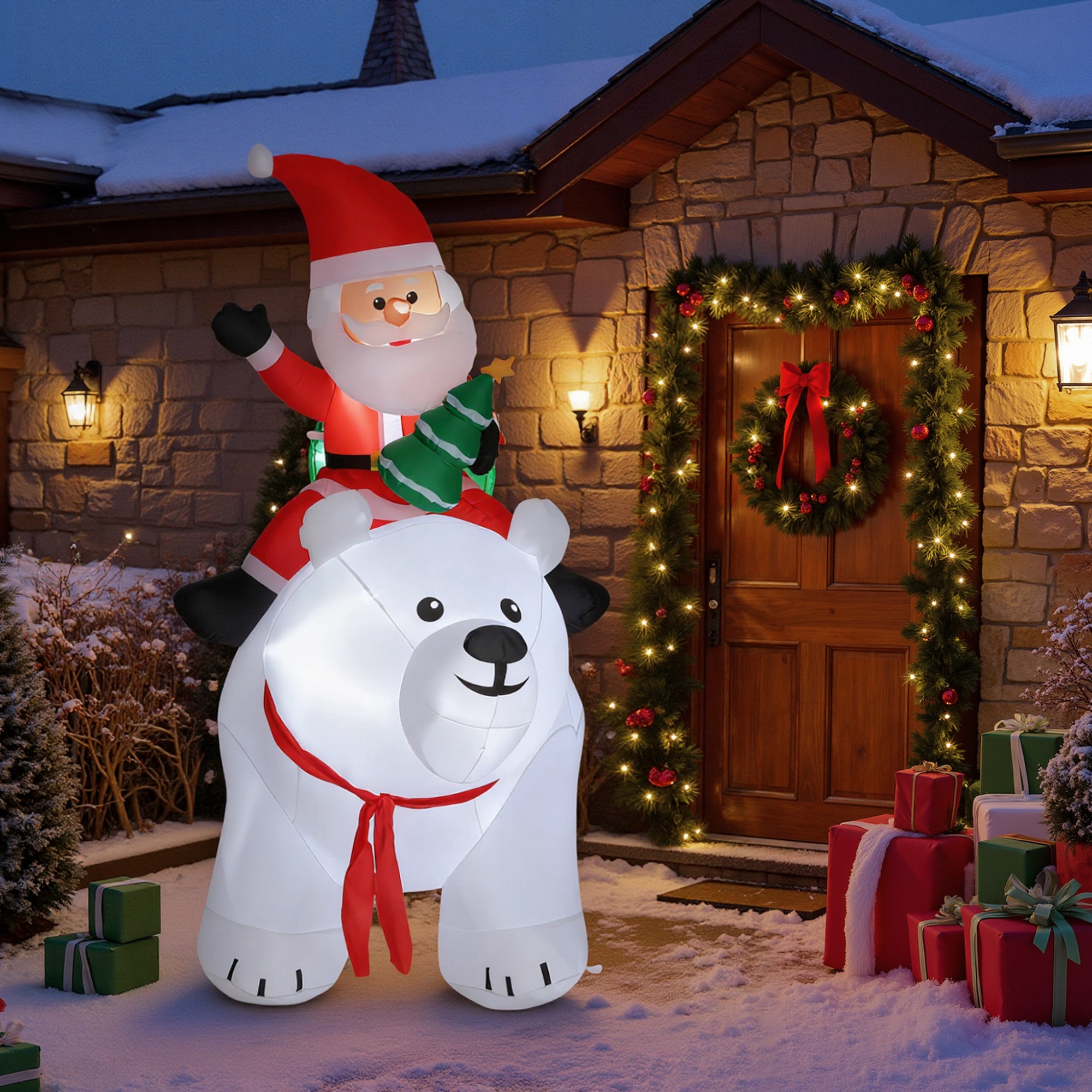 Père Noël et ours polaire illuminés la nuit