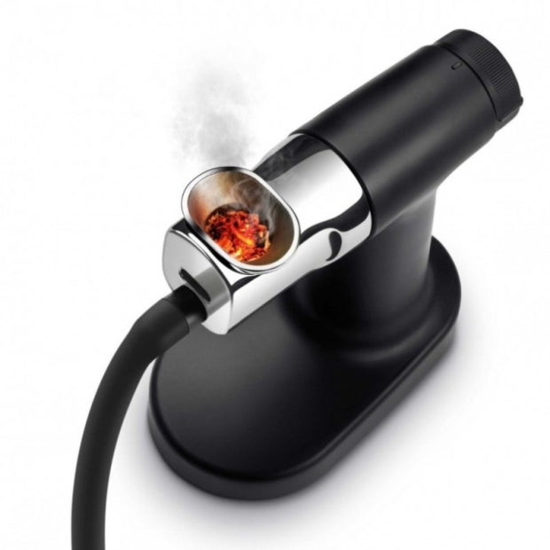 Pistola affumicatrice professionale a freddo con braciere in alluminio, fumo visibile.