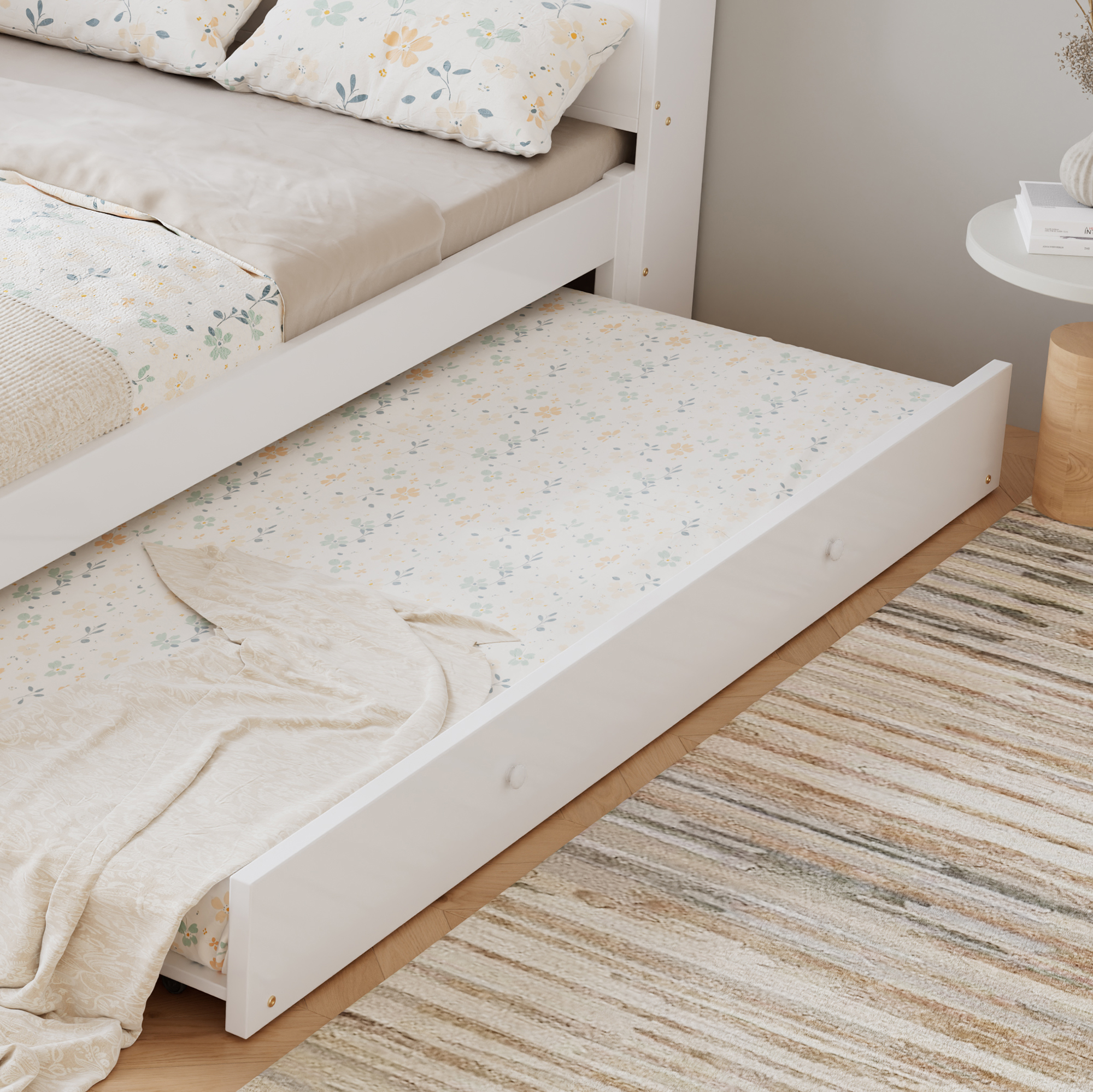 Détails du lit gigogne et des rangements latéraux