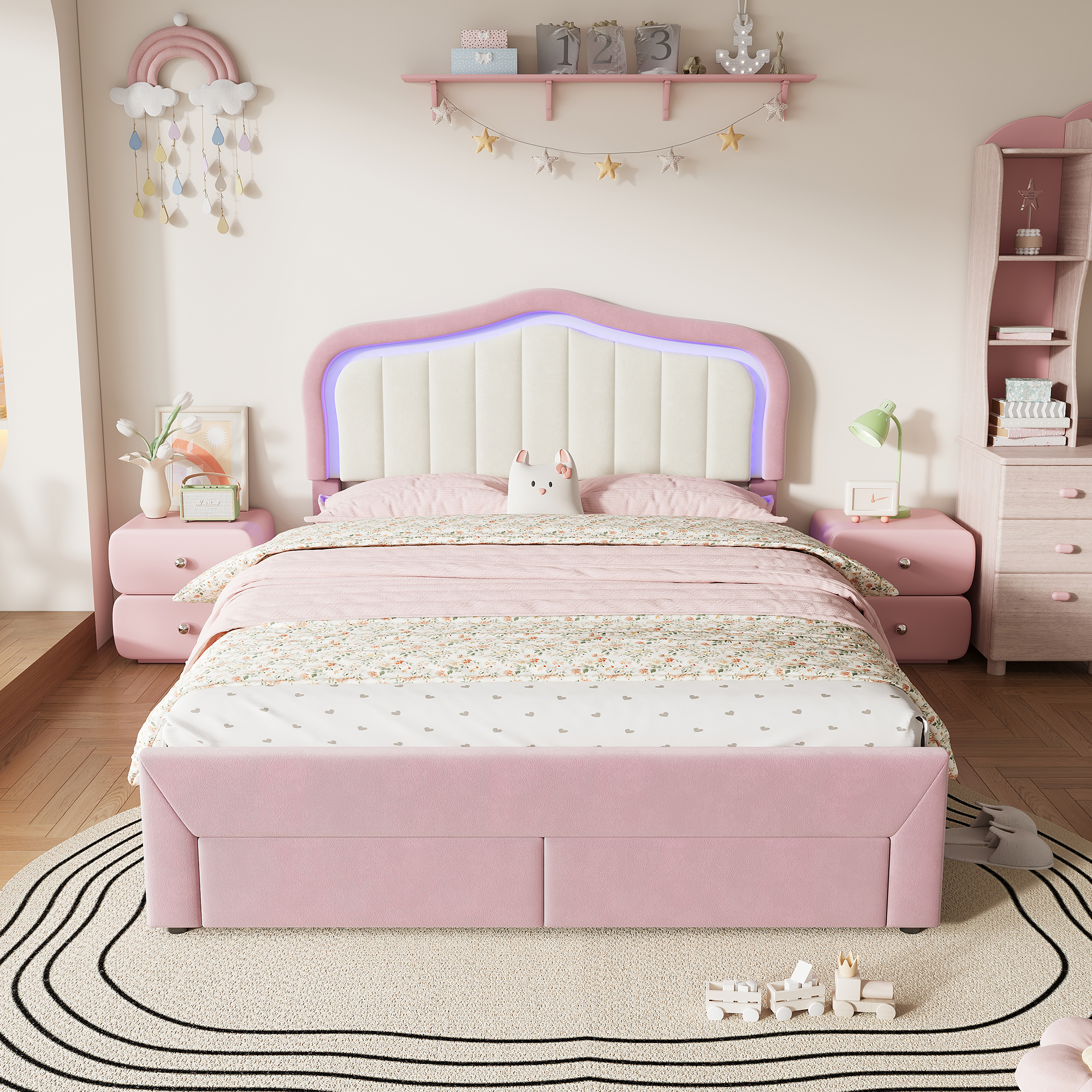 Détail du lit enfant rose avec dossier blanc et éclairage LED