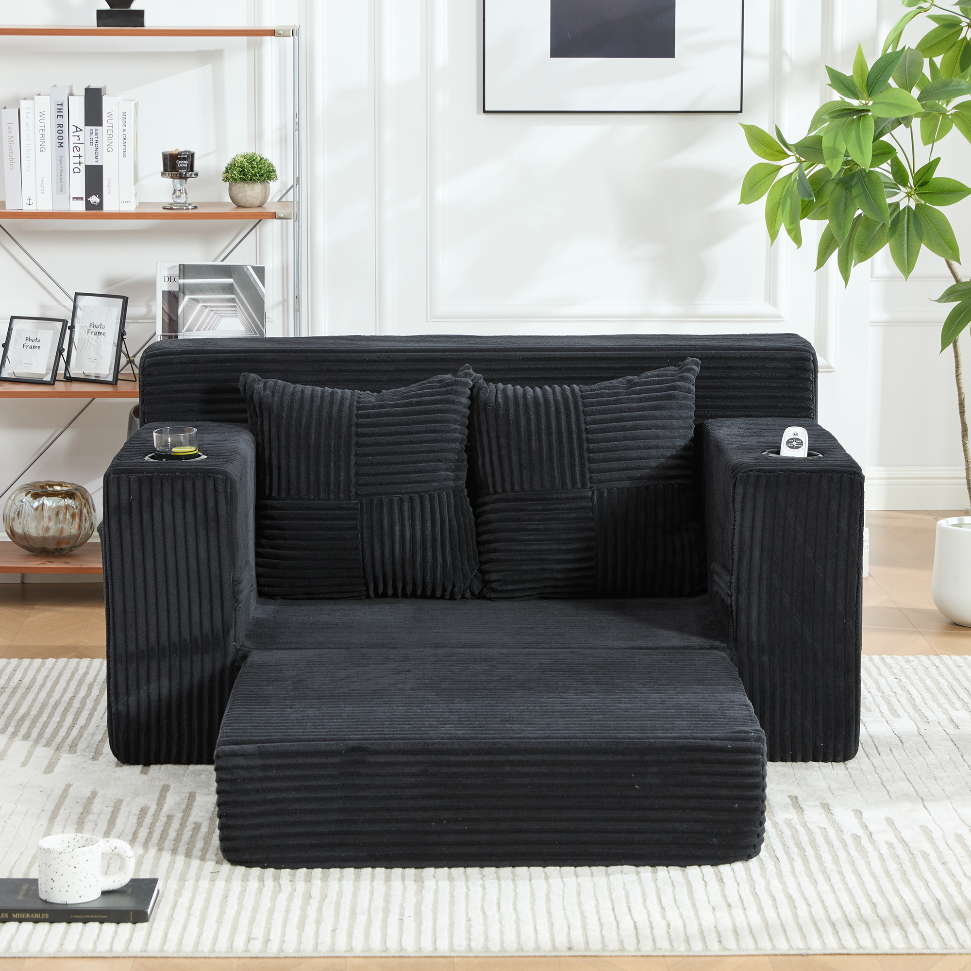 Canapé 2 places noir en velours côtelé avec coussins et poches latérales