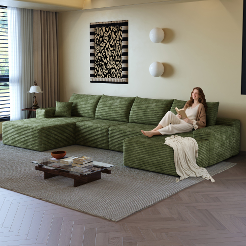 Assise et méridienne du canapé vert en velours côtelé
