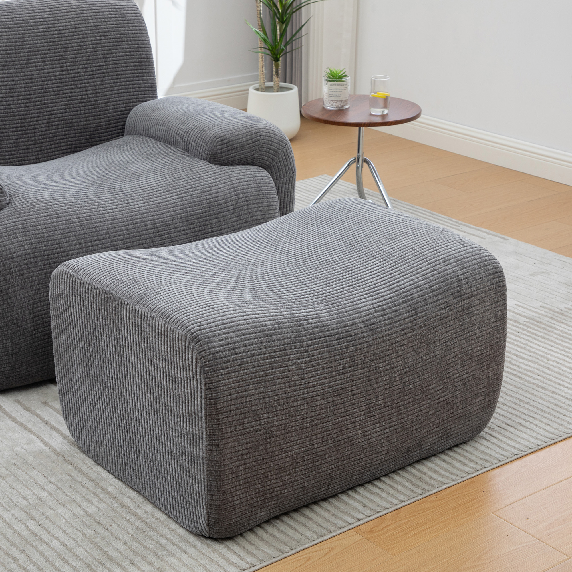 Fauteuil chenille gris avec pouf compressible - vue 4