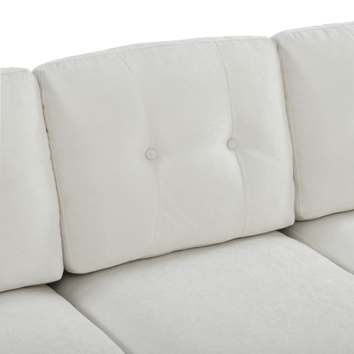 Dossier capitonné du canapé en chenille beige