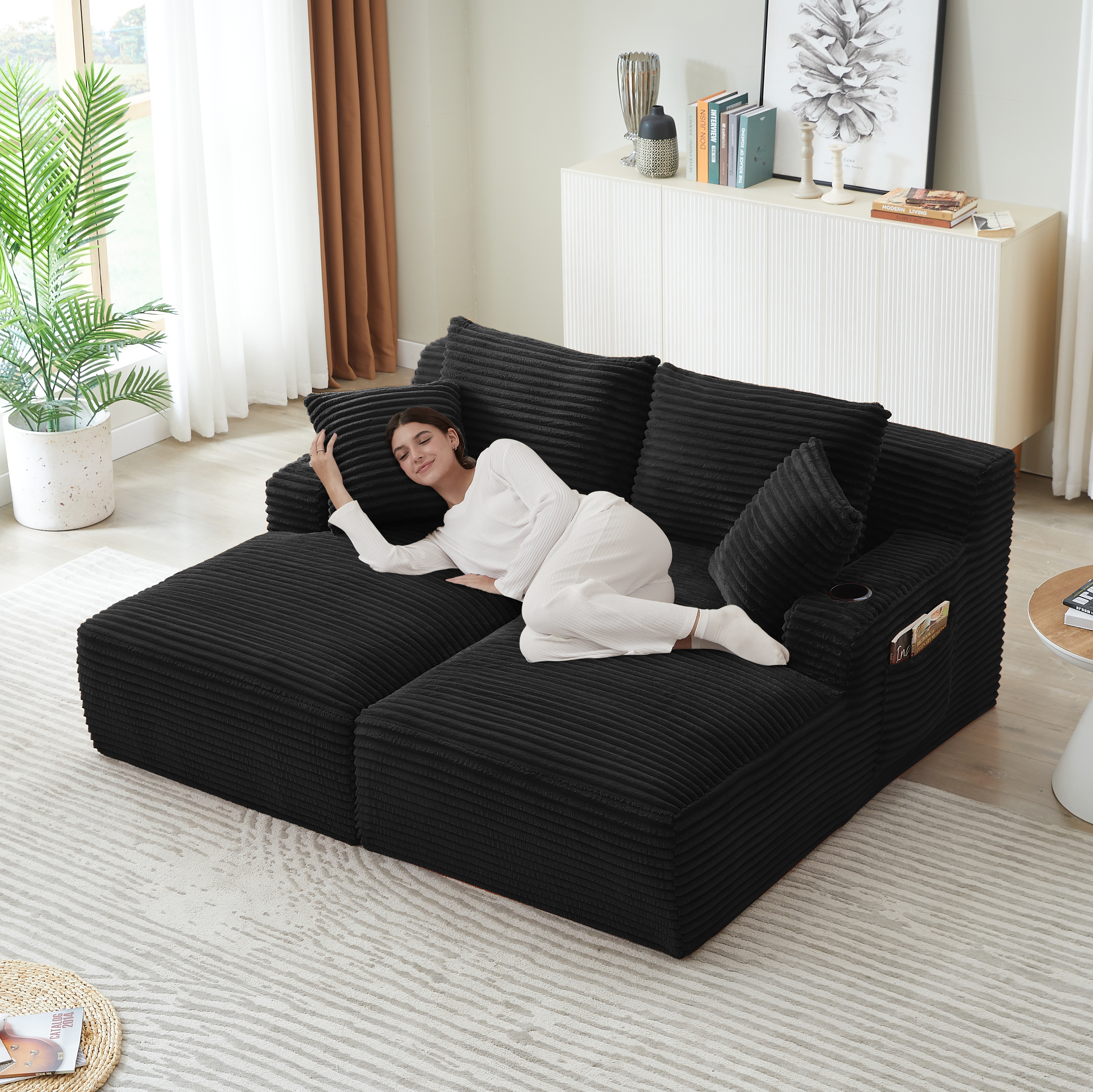 Détail canapé chaise longue avec porte-gobelets