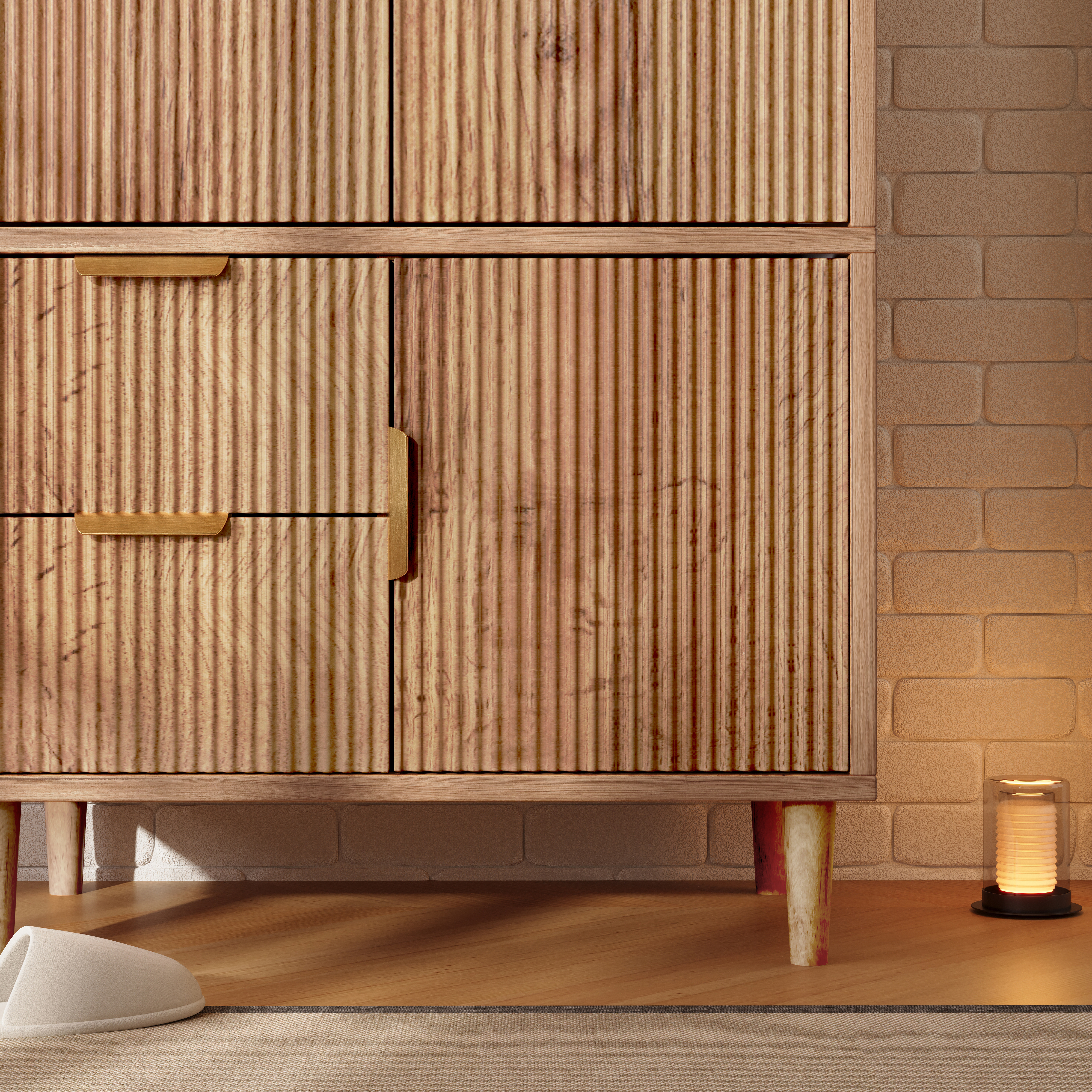 Armoire avec garde au sol et dispositif anti-basculement