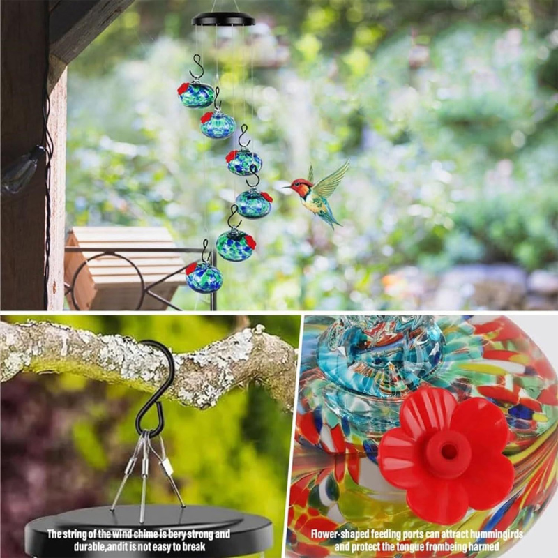 Colibrí alimentándose en un comedero rojo