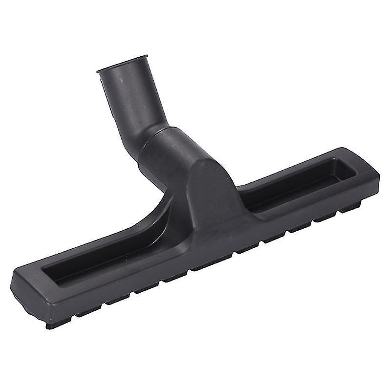 Brosse en action sur sol carrelé