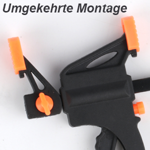 Pince ou outil de préhension en plastique noir avec accents oranges et fonctions de réglage, illustrés sur fond blanc.