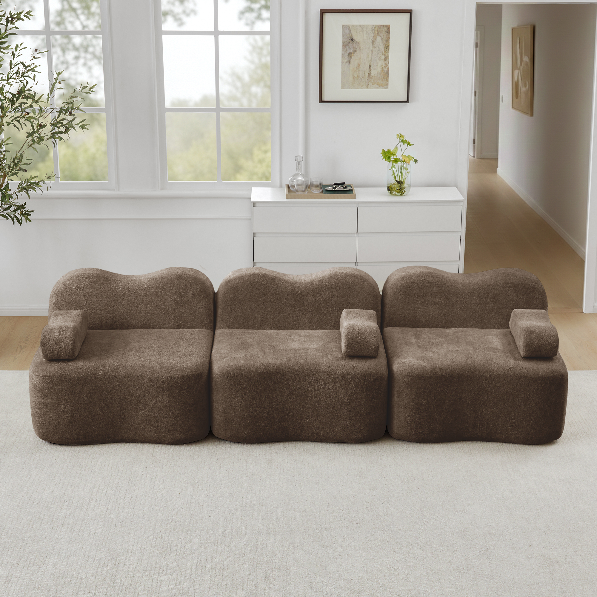 Canapé modulaire 3 places marron en velours, sans structure rigide, avec assise profonde et forme ondulée