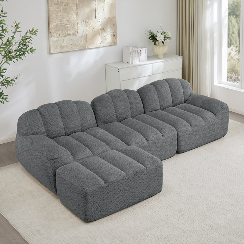Canapé modulaire gris 3 places en L avec ottoman et assise profonde