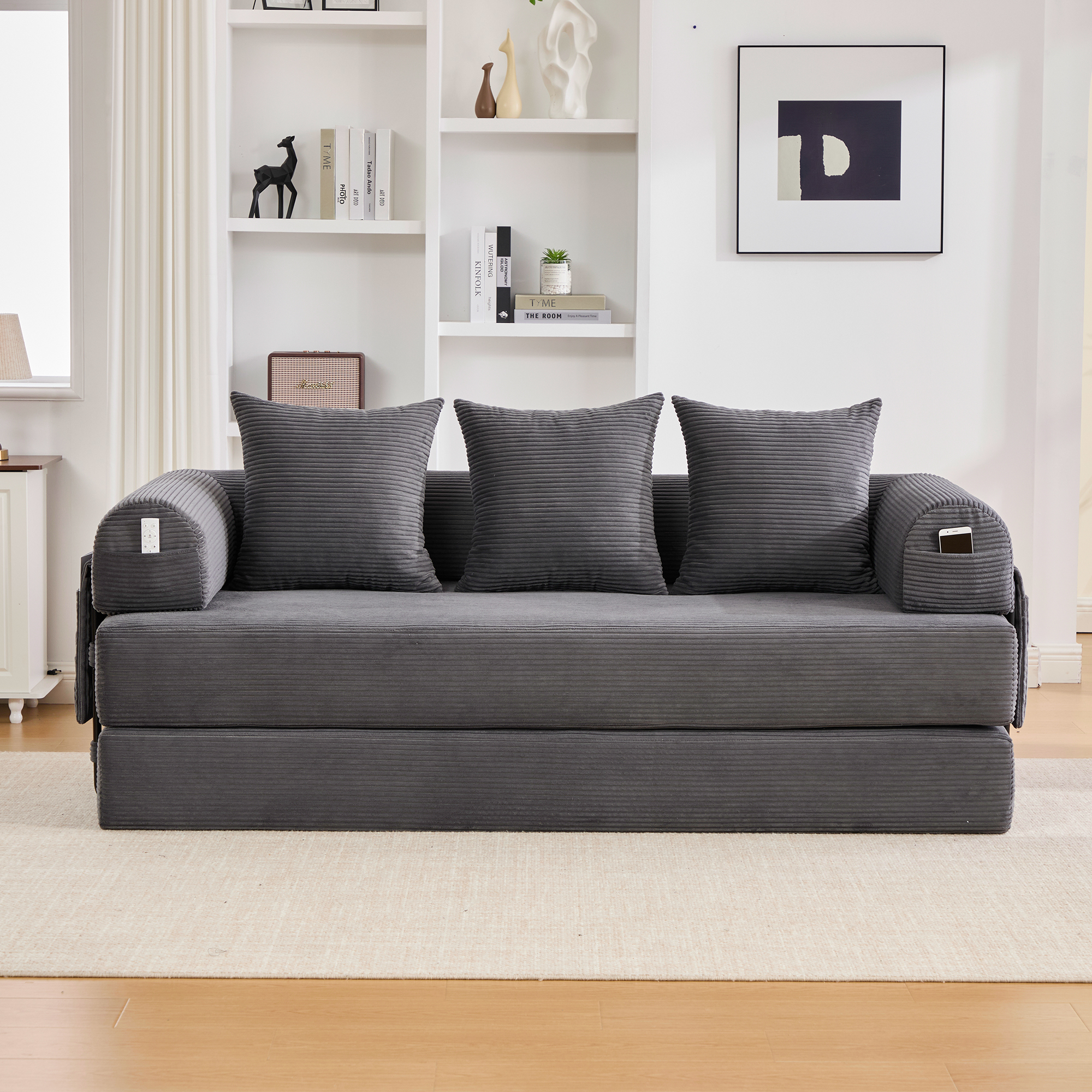 Canapé modulaire 3 places gris foncé en velours côtelé avec structure métallique, poches latérales et trois coussins