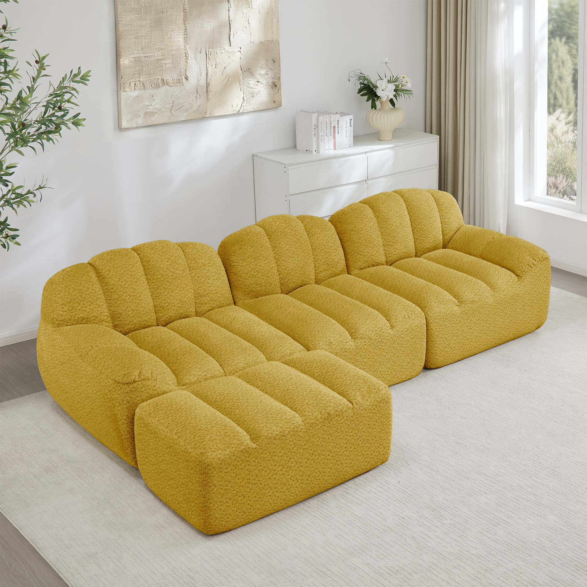 Canapé modulable 3 places en L jaune avec ottoman, sans structure rigide et assise profonde