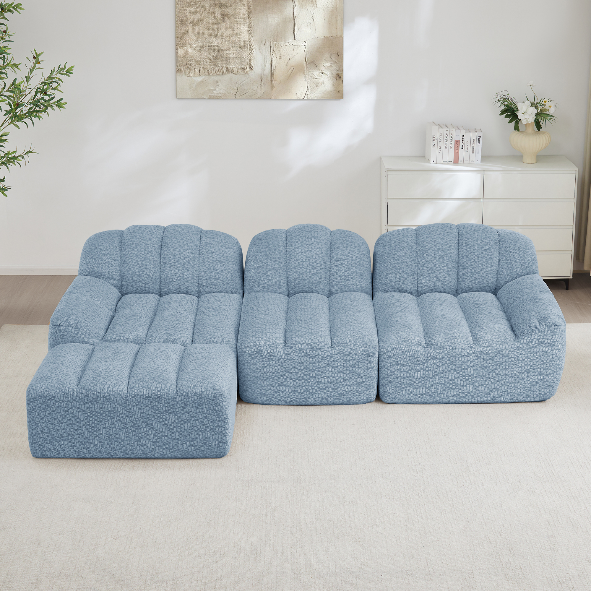 Canapé modulaire 3 places en L bleu avec ottoman, sans structure rigide