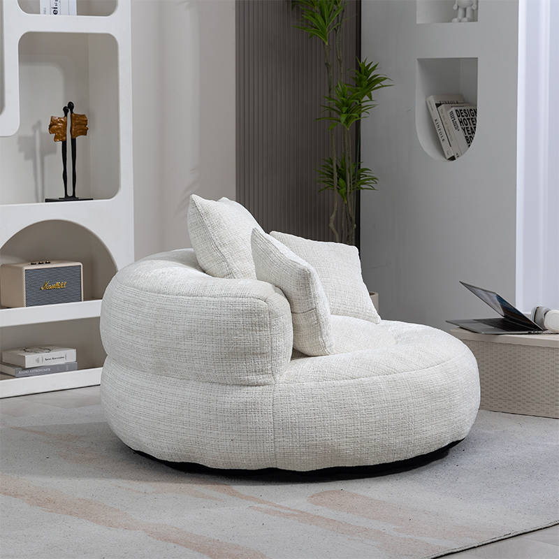 Détail dossier haut et coussins beige