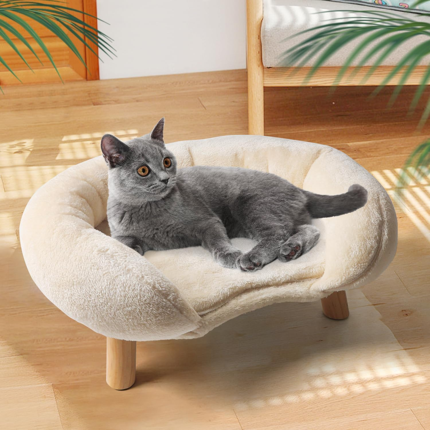 Canapé beige pour chat avec bord surélevé et base antidérapante