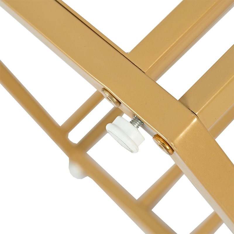 Goldener Metallfuß im Ast-Design