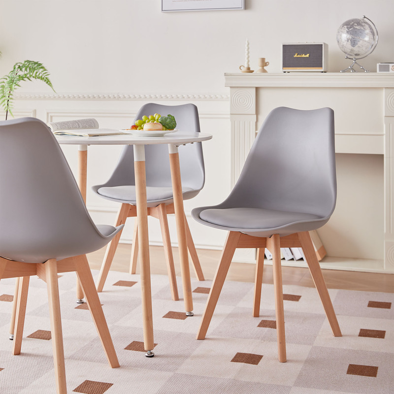 Detalles de los acabados: patas de haya, tablero MDF y ergonomía de las sillas