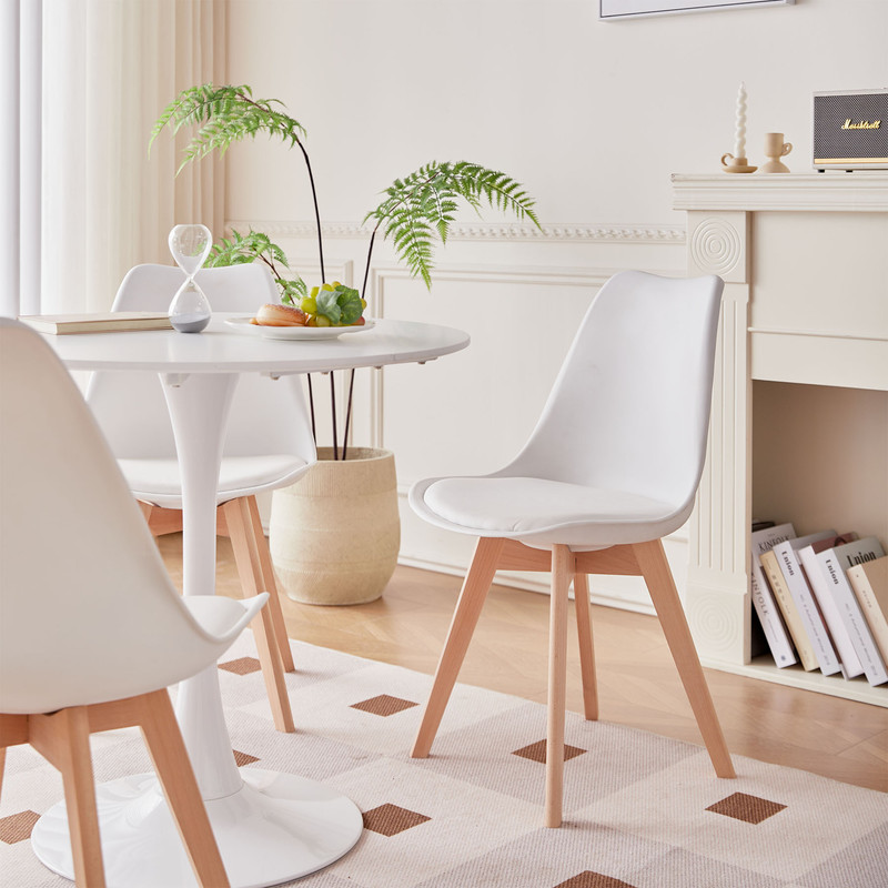 Cucina compatta stile minimalista con tavolo rotondo