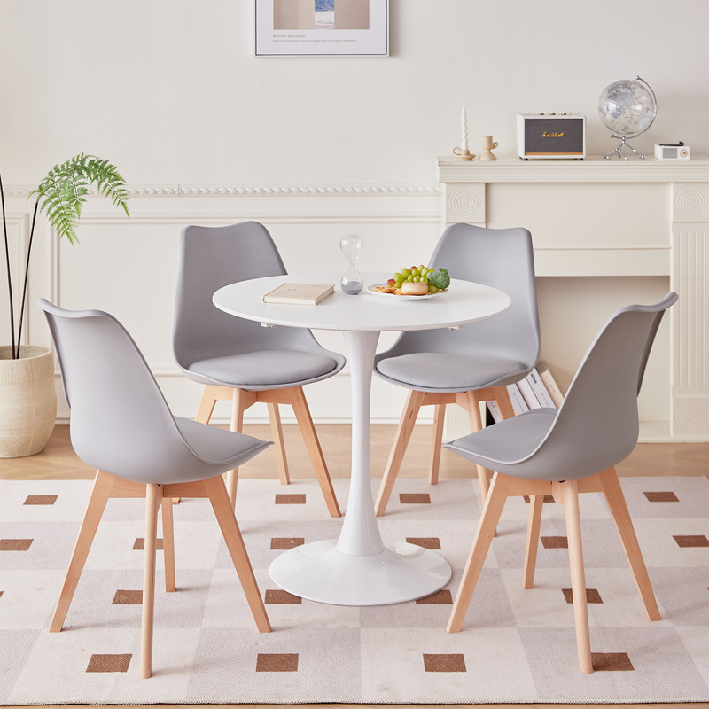Cocina compacta estilo minimalista con mesa redonda