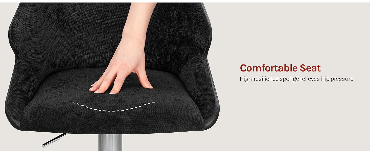 Text reads 'Comfortable Seat'. Black textured office or gaming chair seat with quilted diamond pattern detail, showing ergonomic cushioning and upholstered design.
