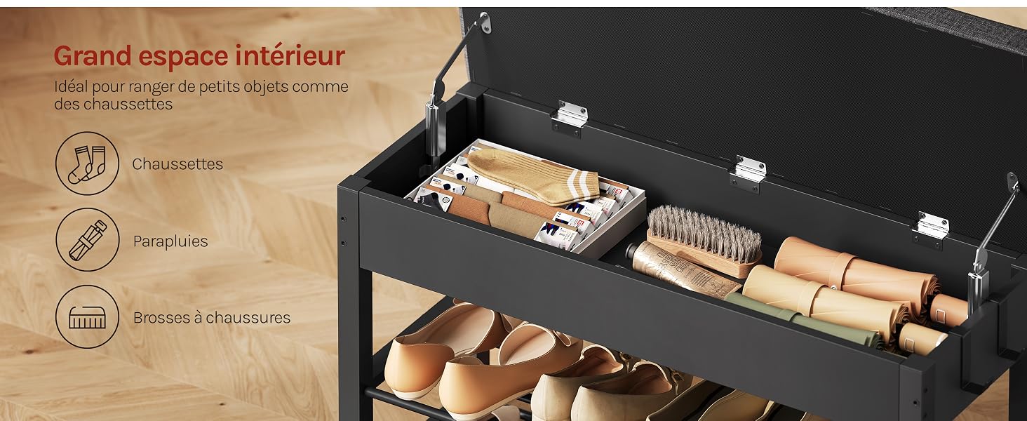 Le texte indique « Grand espace intérieur » avec des icônes de produits. Boîte de rangement noire ouverte avec plusieurs compartiments contenant des articles roulés, des bijoux et des accessoires organisés à l'intérieur.