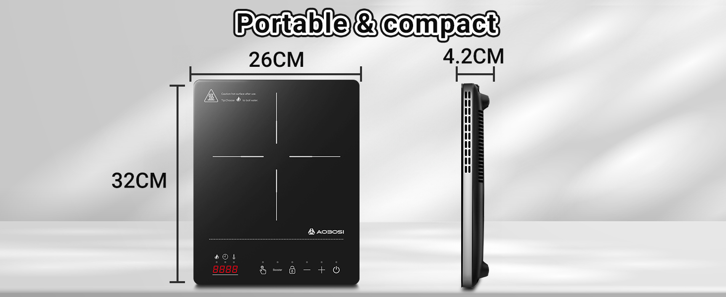 dont les dimensions sont indiquées : 26 cm de largeur, 32 cm de longueur, 4,2 cm d'épaisseur. Surface noire avec motif croisé et panneau de commande.