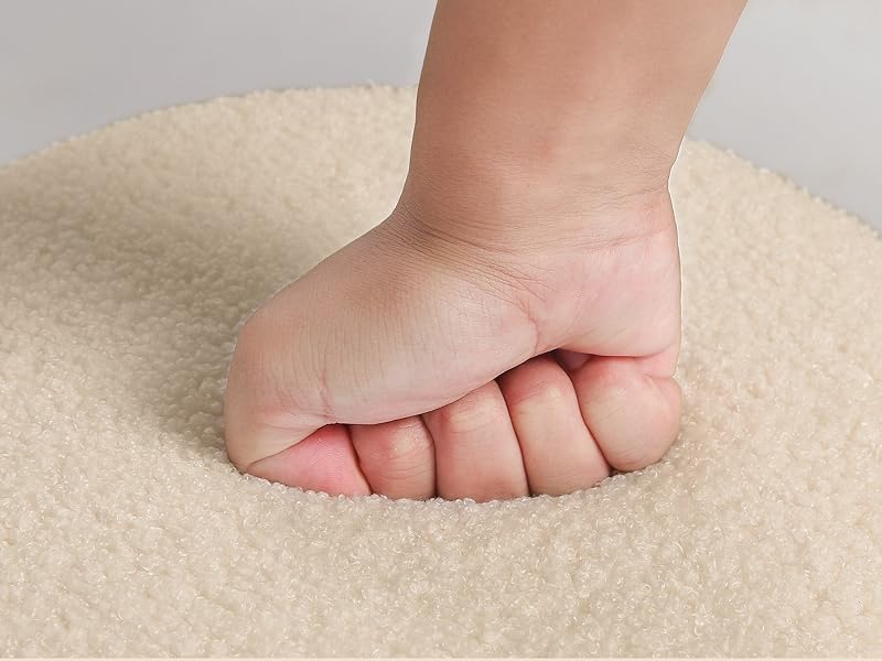Multiple detailed shots of bare baby feet pressed against a light-colored plush surface, showing different angles and positions.