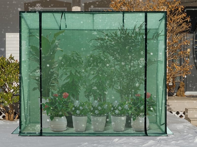 Grande recinto a rete verde per piante, con una struttura robusta e più piante in vaso all'interno. Progettato per uso esterno e protezione delle piante