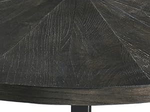 Round two-tier coffee table with dark wood-textured tops and black metal frame. Features a circular design with radial grain pattern and lower storage shelf.