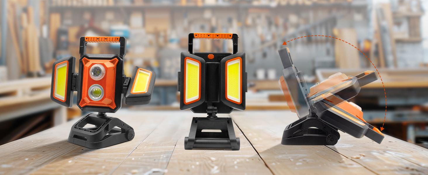 Trois lampes de chantier sur une surface en bois. Gauche : rouge/orange, centre : jaune, droite : gris. Différentes formes et tailles, adaptées aux différents besoins d'éclairage des chantiers