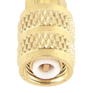 a gold plated brass ring with a diamond pattern