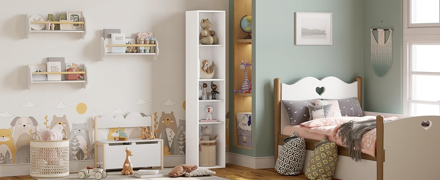 a white storage unit with a wooden shelf and a teddy bear on the wall.