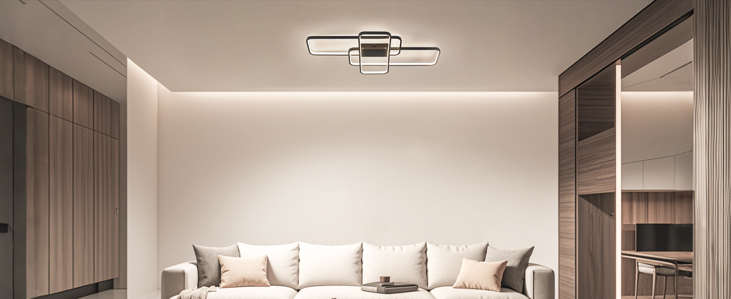 Moderne rechteckige Deckenleuchte mit mehreren miteinander verbundenen LED-Leisten, montiert in einem minimalistischen Wohnzimmer mit neutralen Farbtönen und einem weißen Sofa