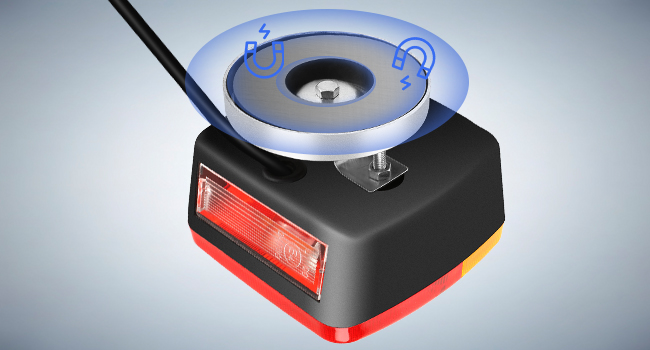 Electronic device with black and red base featuring a circular blue illuminated ring on top and scanning capability.