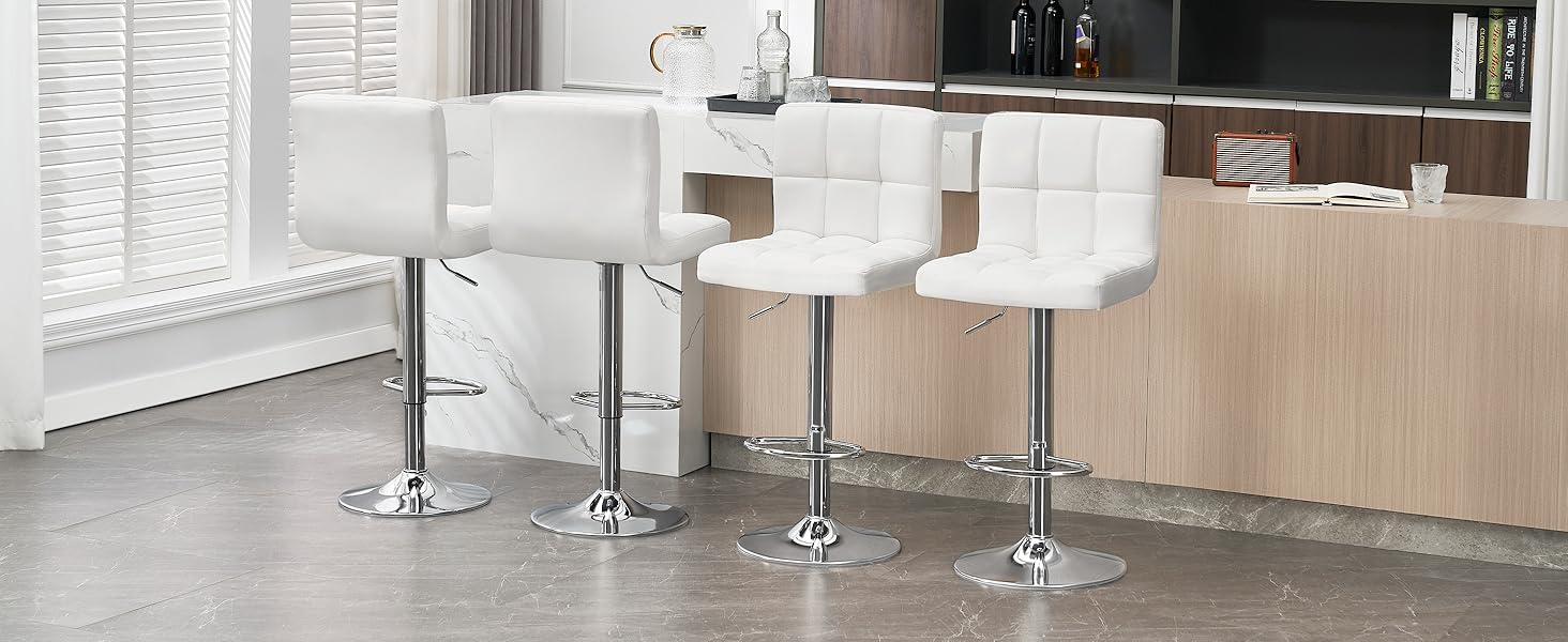 un taburete de bar blanco con patas cromadas.