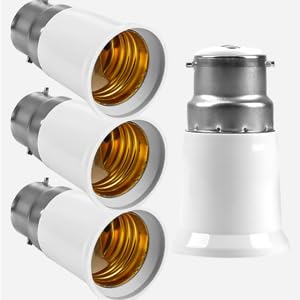 Multiple light bulb adapters shown in silver/white finish with brass-colored internal threading, displayed from different angles against white background.