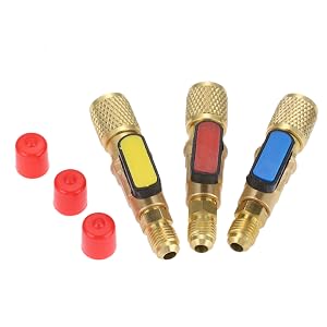 Three brass HVAC service valves with color-coded handles in yellow, red, and blue, accompanied by three red protective caps.
