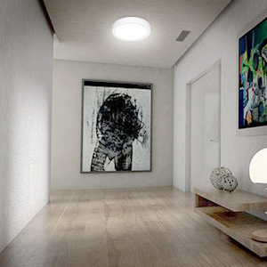 a room with a painting and a wall with a picture on it.