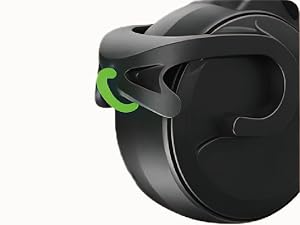 Matte black VR headset with neon green accents shown from multiple angles, featuring curved visor and adjustable head strap design.