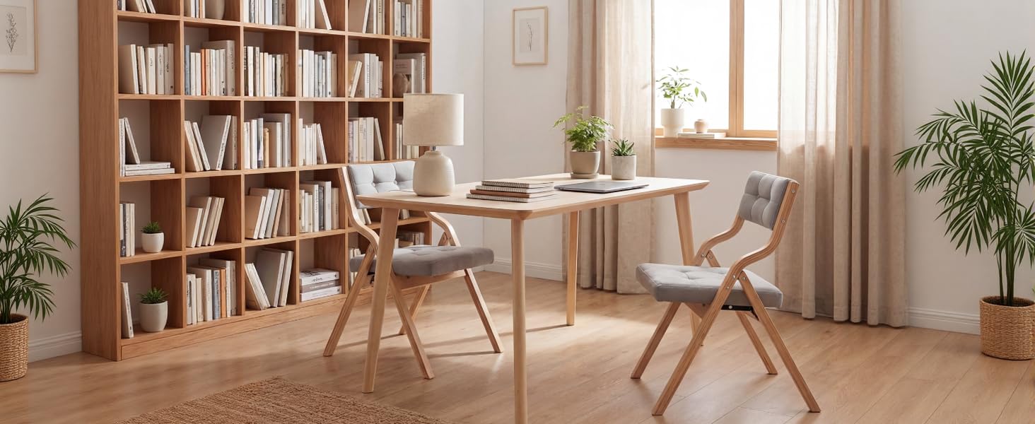 Bright, modern workspace with wooden furniture, bookshelves lining the walls, large windows, and indoor plants creating a cozy study environment.