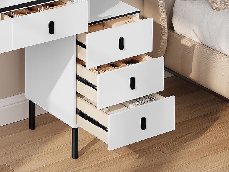 blanco con estructura de metal negro, con cinco cajones, un gran espejo circular y una superficie superior plana. Se muestra en un entorno de dormitorio