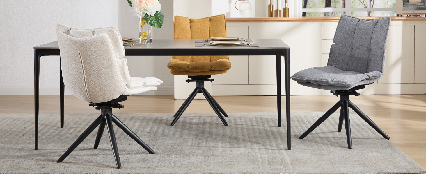 Modern dining room setup featuring swivel chairs with gray upholstery and metal star-shaped bases, arranged around a contemporary dining table.